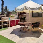 De Madera Junto Al Jaras *